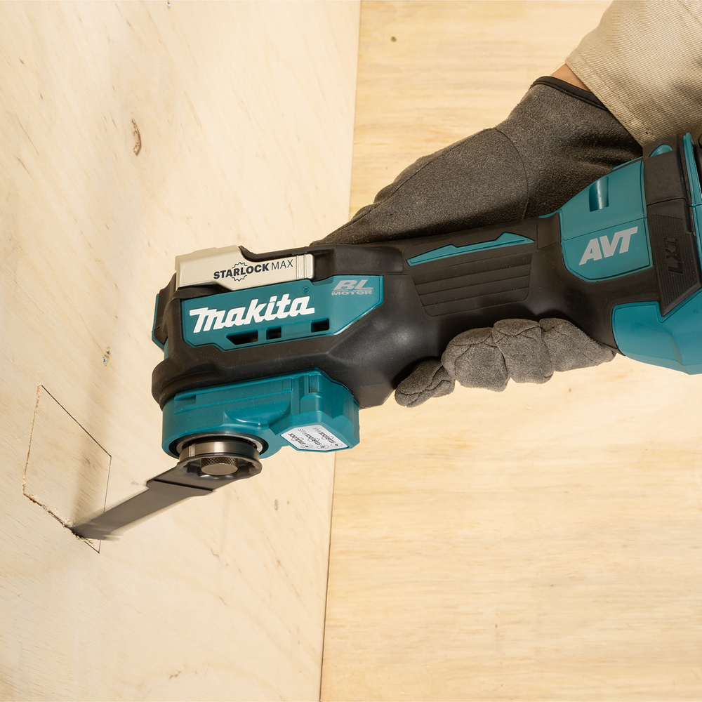 Многофункциональный инструмент Makita DTM52RFJX2 18V 2x3,0Ah + насадки Starlock Max